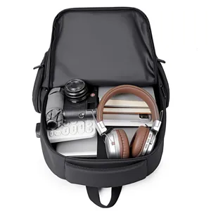 Men's black Oxford cloth business travel laptop backpack, large capacity storage.