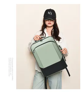 Detail view of casual travel laptop backpack, stylish green and black contrast design.