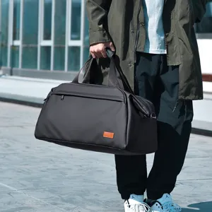 Large capacity black travel duffel bag for short trips, business and gym, waterproof.
