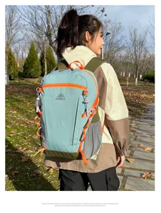 Lightweight outdoor hiking backpack, large capacity splashproof rucksack for travel and sports.