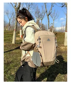 Detailed view of the lightweight outdoor hiking backpack worn outdoors, showing design.