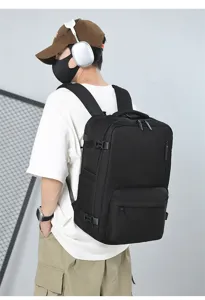 Detail shot of the large capacity business travel backpack worn on model, showing durable fabric.