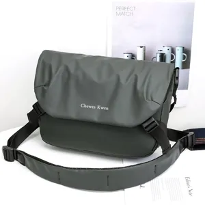 Stylish men's crossbody messenger bag in dark grey oxford cloth with adjustable strap.