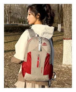 Lightweight outdoor backpack detail view, 29L capacity hiking daypack in grey and red.