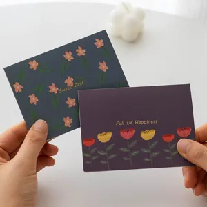 Biglietto di auguri floreale vintage per compleanno, vista principale con due eleganti cartoline.
