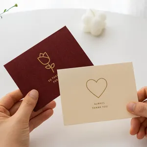 Minimalist hot stamping greeting card with elegant golden heart and tulip designs for all occasions.