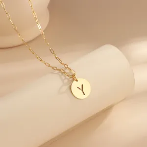 Gold paperclip chain necklace featuring a stylish hollow letter Y round pendant.