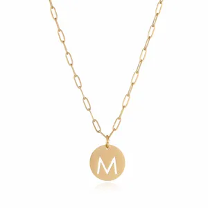Gold stainless steel paperclip chain necklace featuring a hollow letter M round pendant for women.