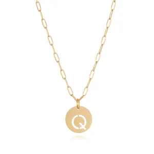 Gold stainless steel paperclip chain necklace with hollow letter Q pendant detail view.