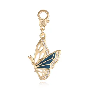 Colgante de mariposa de cobre dorado con esmalte azul y cristales para collar pulsera DIY.