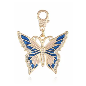 Colgante de dijes de mariposa de esmalte azul chapado en oro de cobre con diamantes de imitación