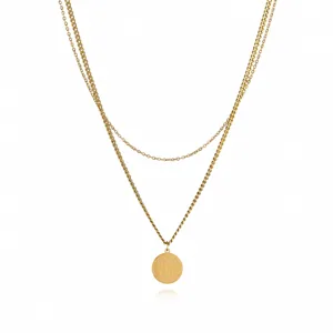 Detailed view of gold double layer layered necklace with letter W pendant stainless steel