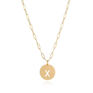 Gold stainless steel paperclip chain necklace detail, featuring hollow letter X round pendant.