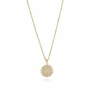 Detailed view of the gold-plated initial pendant necklace, showcasing paved zircon and chain.