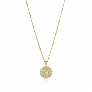 Gold initial M necklace with cubic zirconia paved round pendant and beaded chain.