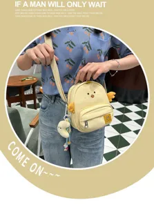 Cute yellow chick canvas cross-body bag for women and kids, stylish cute cartoon shoulder bag.