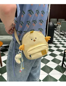 Cute cartoon duckling crossbody bag for women and kids, soft canvas shoulder bag for daily use.