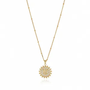 Close-up detail view of the gold letter pendant necklace, sparkling cubic zirconia stones.