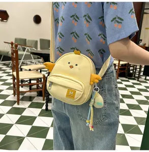 Cute yellow cartoon chicken crossbody bag for women and girls, sweet style student shoulder bag.