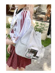 Zaino Ita in tela leggera con finestra trasparente per spille anime e uso quotidiano.