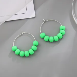 Bohemian candy color green beaded hoop earrings for women, minimalist chic jewelry accessories.