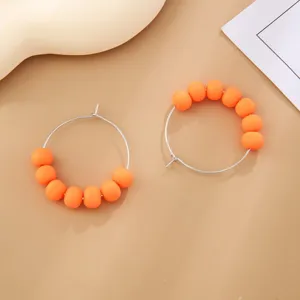 Bohemian polymer clay bead hoop earrings for women, minimalist candy color metal jewelry style.