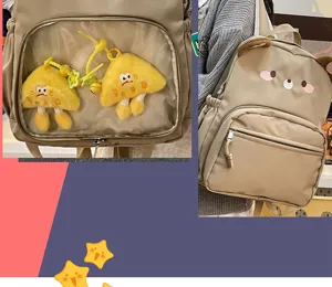 Zaino kaki carino con tasca trasparente, orecchie d'orso e simpatici ciondoli in peluche per ragazze.