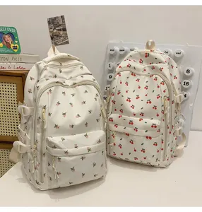 Floral and cherry print school backpack for students, lightweight commuter daypack for daily use.