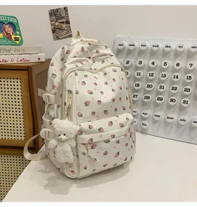 Cute white strawberry print school backpack for girls, lightweight casual daily commuter bag.