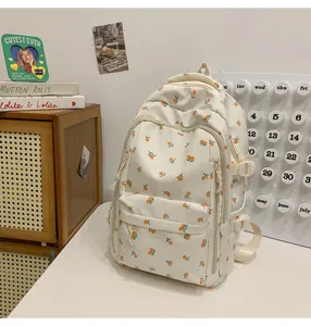 Cute orange fruit print white school backpack for teen girls daily commute and travel lightweight