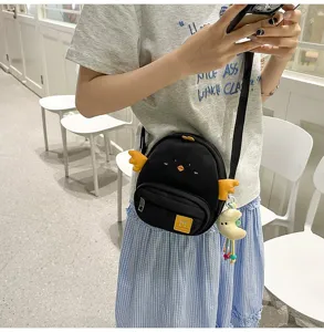Cute black canvas crossbody bag for women and teens, featuring adorable cartoon chick design.