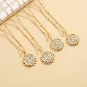 Gold-plated rhinestone letter pendant clavicle chain set, elegant alphabet necklace for women.