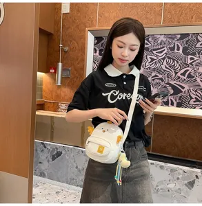Cute cartoon chick crossbody bag detail, sweet style phone bag for girls and students.