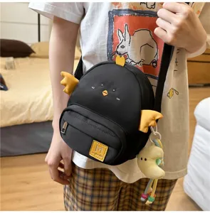 Cute black chick crossbody bag for women, soft cartoon shoulder bag with cute wings and strap.