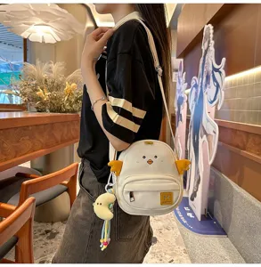 Cute cartoon chick canvas crossbody bag for women, sweet student shoulder messenger bag.