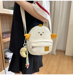 Cute cartoon chick canvas crossbody bag for women, sweet Japanese style daily shoulder bag.