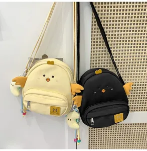Cute cartoon chick canvas crossbody bag, sweet style small shoulder bag for girls and kids.
