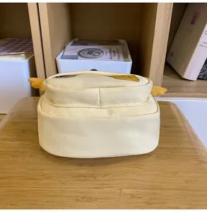 Cute canvas crossbody bag with small wings for women and kids, casual daily shoulder bag.