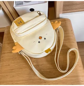Cute yellow duck canvas crossbody bag, lovely cartoon chick design with 3D wings.