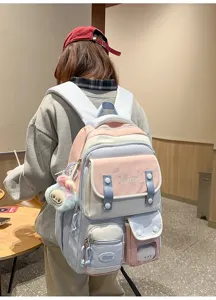 Pastell rosa blauer Student Rucksack mit grossem Volumen und niedlichem Plueschanhaenger