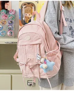 Cute nylon student backpack, casual large capacity solid color school bag for women daily use.
