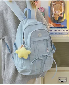 Light blue nylon casual student backpack with plush star pendant and multi pockets for daily use.