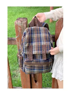 Japanese vintage plaid backpack for women, retro casual double shoulder bag for daily use.