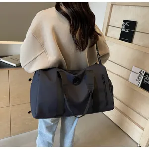 Grand sac de voyage de grande capacite pour femmes, sac de sport multifonctionnel avec compartiment.