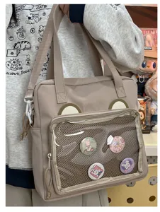 Cute ita bag shoulder crossbody bag with transparent mesh window for pins and cute bear ears design.