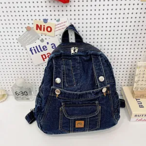 Retro denim backpack for women, casual vintage bookbag with multi pockets and zippers.