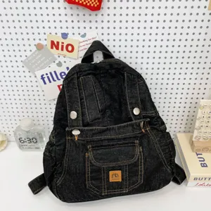 Dark denim backpack with multi-pocket design, retro casual commuter travel shoulder bag.