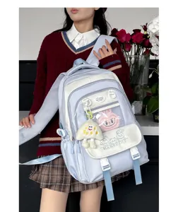 Süßer koreanischer Studenten-Rucksack mit großem Fassungsvermögen und niedlichen Anhängern.