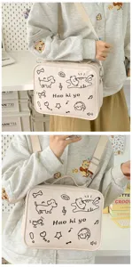 Cute cartoon PU crossbody bag for women, casual Japanese style shoulder bag with strap.