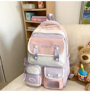 Pastellfarbener Mehrfachtaschen Rucksack für Studenten, große Kapazität, süßer Schulranzen.